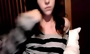 Busty coddle masturbates out of reach of webcam